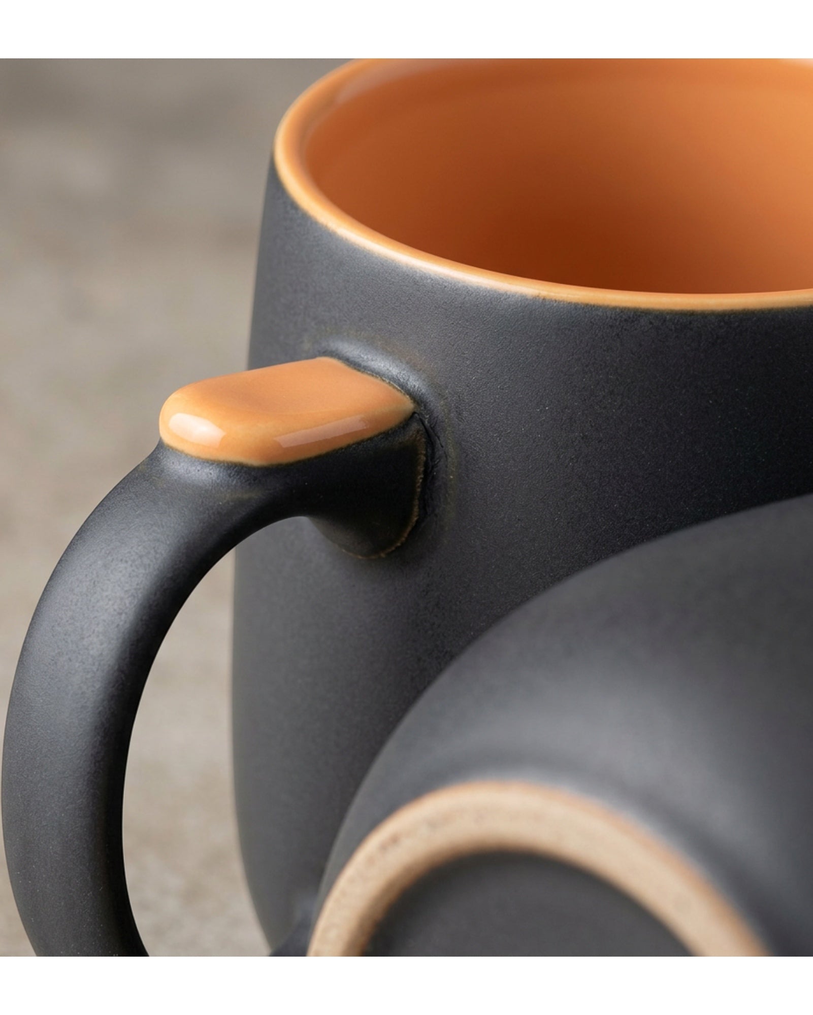 Klnxw Wide Belly Thumb-Rest Ceramic Coffee Mug 16 oz Charcoal Apricot - Detail view